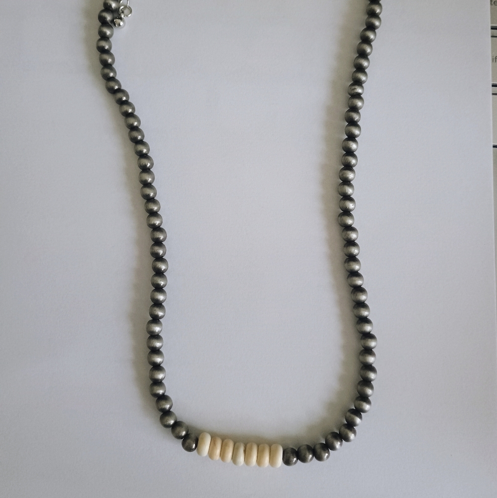 Elegant Silver and Cream Beaded Necklace